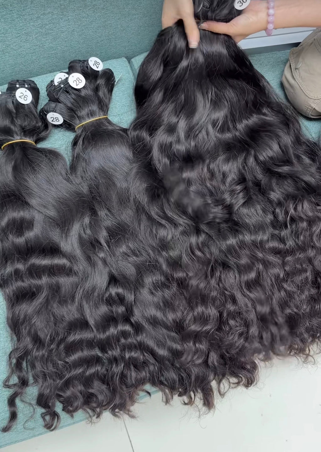 RAW INDIAN CURLY BUNDLES